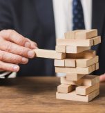 businessman-playing-jenga