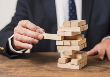 businessman-playing-jenga